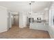 Open dining area with kitchen island and tile flooring at 1719 W Owens Way, Anthem, AZ 85086