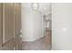 Bright entryway with tile flooring and a modern light fixture at 1719 W Owens Way, Anthem, AZ 85086