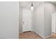 Light and airy entryway with tile flooring and neutral walls at 1719 W Owens Way, Anthem, AZ 85086