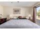 Spacious bedroom with large window and wood floors at 178 Leisure World --, Mesa, AZ 85206
