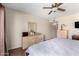 Bedroom with dresser, large bed, and ceiling fan at 178 Leisure World --, Mesa, AZ 85206