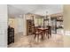 Bright dining room with chandelier and patio access at 178 Leisure World --, Mesa, AZ 85206