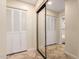Hallway with mirrored closet doors and tile floors at 178 Leisure World --, Mesa, AZ 85206
