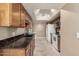 Kitchen features granite countertops and white appliances at 178 Leisure World --, Mesa, AZ 85206