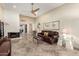 Living room features a fireplace and leather sofa at 178 Leisure World --, Mesa, AZ 85206