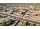 Aerial view showing a house's location in a residential area at 18706 W Arlington Rd, Buckeye, AZ 85326