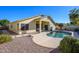 Landscaped backyard oasis featuring a refreshing pool at 226 S 122Nd Ln, Avondale, AZ 85323