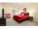 Spacious bedroom with a comfortable king-size bed at 226 S 122Nd Ln, Avondale, AZ 85323