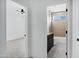 Clean bathroom with a tub and wood-like tiled walls at 2330 N 28Th Pl, Phoenix, AZ 85008