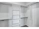 Bright walk-in closet with ample shelving and hanging space at 2330 N 28Th Pl, Phoenix, AZ 85008