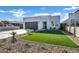 Newly built home with artificial turf and gravel landscaping at 2332 N 28Th Pl, Phoenix, AZ 85008