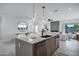 Open concept kitchen with large island and breakfast bar seating at 2330 N 28Th Pl, Phoenix, AZ 85008