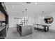 Modern kitchen features island, stainless steel appliances, and sleek cabinetry at 2330 N 28Th Pl, Phoenix, AZ 85008