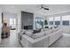 Spacious living room with large sectional sofa and modern fireplace at 2330 N 28Th Pl, Phoenix, AZ 85008