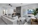 Open concept living room with sectional sofa and access to backyard at 2330 N 28Th Pl, Phoenix, AZ 85008