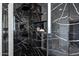 Sleek shower with black marble tile and built-in shelving at 2330 N 28Th Pl, Phoenix, AZ 85008