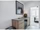 Modern wet bar with wine cooler and sleek countertop at 2330 N 28Th Pl, Phoenix, AZ 85008