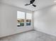 Simple bedroom with two windows and ceiling fan at 2336 N 28Th Pl, Phoenix, AZ 85008