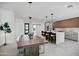Modern kitchen with an island and dining area at 2336 N 28Th Pl, Phoenix, AZ 85008