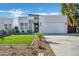 Modern home with a two-car garage and landscaped front yard at 2336 N 28Th Pl, Phoenix, AZ 85008