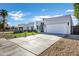Modern home's exterior, showcasing landscaping and driveway at 2336 N 28Th Pl, Phoenix, AZ 85008