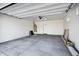 Garage with open overhead door and concrete floor at 2336 N 28Th Pl, Phoenix, AZ 85008
