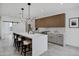 Modern kitchen with island and wood cabinets at 2336 N 28Th Pl, Phoenix, AZ 85008