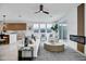 Bright living room includes modern furniture and a marble coffee table at 2336 N 28Th Pl, Phoenix, AZ 85008