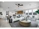 Open concept living area with modern furniture and large windows at 2336 N 28Th Pl, Phoenix, AZ 85008