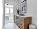 Modern wet bar with wine cooler, sleek cabinetry, and quartz countertop at 2336 N 28Th Pl, Phoenix, AZ 85008