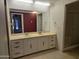 Double sink bathroom vanity with large mirror at 2650 W Union Hills Dr # 33, Phoenix, AZ 85027