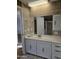 Bathroom features a vanity with storage and tiled shower at 2650 W Union Hills Dr # 33, Phoenix, AZ 85027