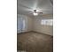 Primary bedroom with carpet flooring and sliding glass doors at 2650 W Union Hills Dr # 33, Phoenix, AZ 85027