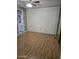 Bedroom with wood-look flooring and ceiling fan at 2650 W Union Hills Dr # 33, Phoenix, AZ 85027