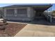 Mobile home with covered porch and ramp access at 2650 W Union Hills Dr # 33, Phoenix, AZ 85027