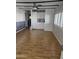 Living room with wood-look flooring and ceiling fan at 2650 W Union Hills Dr # 33, Phoenix, AZ 85027