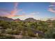 Panoramic aerial view of the community, highlighting the surrounding mountains and landscape at 3282 E Palo Verde Dr, Paradise Valley, AZ 85253