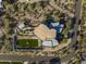 Aerial view of a modern home with a putting green and sports court at 3282 E Palo Verde Dr, Paradise Valley, AZ 85253