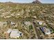Aerial view showcasing a modern home's setting and neighborhood at 3282 E Palo Verde Dr, Paradise Valley, AZ 85253