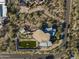 Aerial view of a modern home with a putting green and sports court at 3282 E Palo Verde Dr, Paradise Valley, AZ 85253