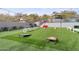Backyard with artificial turf, cornhole, and other games at 3282 E Palo Verde Dr, Paradise Valley, AZ 85253
