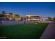 Modern home with a putting green and expansive backyard at 3282 E Palo Verde Dr, Paradise Valley, AZ 85253