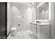 Modern bathroom with marble tile and sleek vanity at 3282 E Palo Verde Dr, Paradise Valley, AZ 85253
