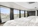 Bedroom with two beds and large windows overlooking scenic views at 3282 E Palo Verde Dr, Paradise Valley, AZ 85253