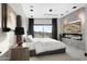 Spacious bedroom with large TV and fireplace at 3282 E Palo Verde Dr, Paradise Valley, AZ 85253