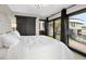 Spacious bedroom with large windows, offering stunning views and ample closet space at 3282 E Palo Verde Dr, Paradise Valley, AZ 85253