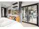 Bedroom with sliding glass doors leading to a patio at 3282 E Palo Verde Dr, Paradise Valley, AZ 85253