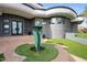 Modern entryway with a unique sculpture and a spacious walkway at 3282 E Palo Verde Dr, Paradise Valley, AZ 85253