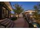 Curving pathway with lighting at night, showcasing modern architecture details at 3282 E Palo Verde Dr, Paradise Valley, AZ 85253