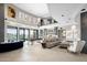 Spacious game room with pool table, wet bar, and comfortable seating at 3282 E Palo Verde Dr, Paradise Valley, AZ 85253